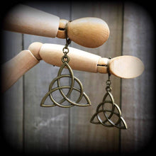 Load image into Gallery viewer, Charmed earrings, Triquetra earrings, Trinity Knot earrings, Celtic earrings, Pagan earrings, Irish earrings, Pierced ears, Stretched ears