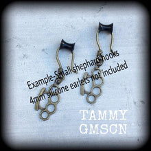 Load image into Gallery viewer, Brass knuckle earrings Knuckle Duster earrings Blood duster earrings Punk earrings Riot Grrl earrings Pierced ears Stretched ears Tapers 0g