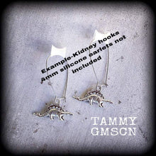 Load image into Gallery viewer, Dinosaur tunnel dangles 4 gauge weights 4mm Gauged earrings Stegosaurus 6mm ear hangers Hanging gauges Reptile jewelry 5mm plug dangles 2g