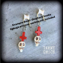 Load image into Gallery viewer, Skull earrings, Voodoo earrings, Los Muertos earrings, Santeria jewelry, Plug earrings, Tunnel earrings, Red inverted cross, Pierced ears
