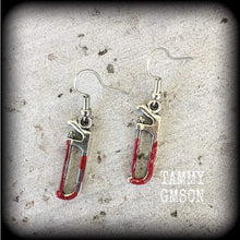 Load image into Gallery viewer, Bone saw earrings Tool earrings Crime scene earrings Murder weapon earrings 0 gauge tunnel earrings 4mm 6mm 8mm plug earrings Gore jewelry